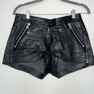 Leather shorts.